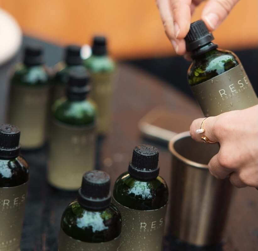 RESET Essentials aroma oils arranged for a SaunaGus session